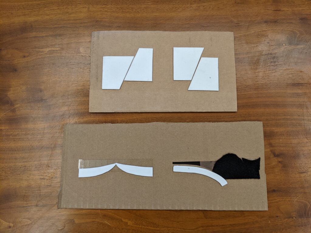 Four hand-sized diagrams for teaching. The upper diagrams show cross sections of normal and reverse faults, and are made of foam on a backing of cardboard. The lower diagrams show cross sections of divergent oceanic plates and convergent continental margins, and are made of foam, felt and acetate sheet on a backing of cardboard.