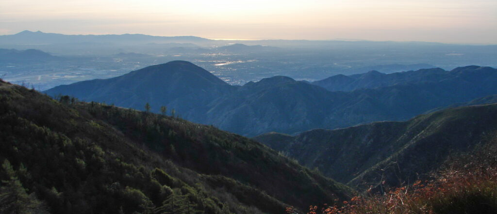 The San Bernardino Valley and L.A. as seen from Cajon pass under a hazy sky.